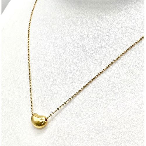 375 - GENUINE TIFFANY & CO YELLOW GOLD ELSA PERETTI DESIGNED BEAN PENDANT & CHAIN, TOTAL WEIGHT 5.4G