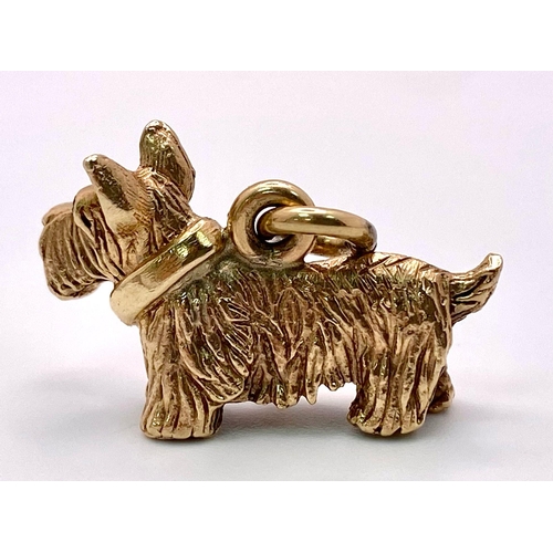 454 - 9K YELLOW GOLD SCOTTIE DOG WITH STONE SET EYES CHARM/PENDANT, WEIGHT 8G