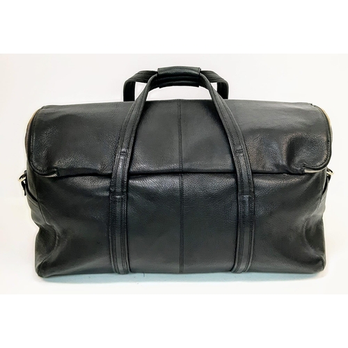 535 - Birioni Black Leather Travel Tote Bag.
Quality leather throughout, two stud release pocket and two e... 