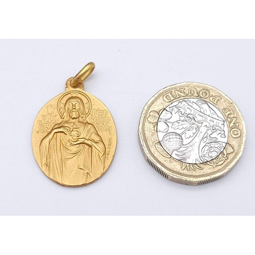 575 - 18k yellow gold double sided religious medallion (2.2cm x 1.8cm) weight 6g