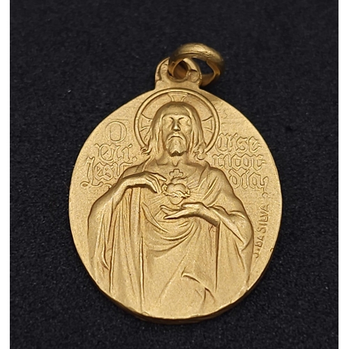 575 - 18k yellow gold double sided religious medallion (2.2cm x 1.8cm) weight 6g