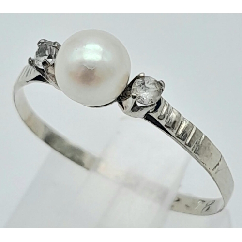 931 - 18k white gold pearl and CZ stone set trilogy ring, 0.7g, size L