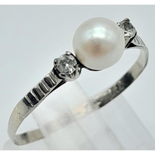 931 - 18k white gold pearl and CZ stone set trilogy ring, 0.7g, size L