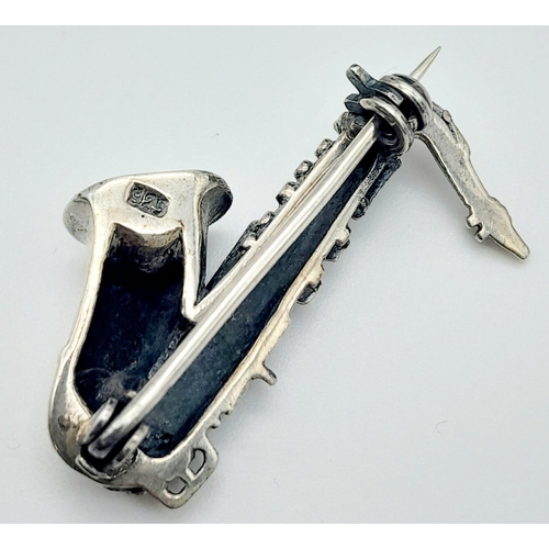 1163 - A Vintage Sterling Silver, High Quality Detail, Saxophone Bar Brooch. 3.3cm Length. 5.59 Grams