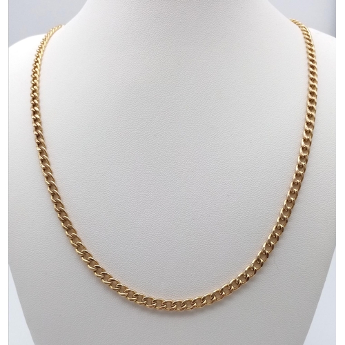 1275 - An Italian 9K Yellow Gold Curb Link Chain. 60cm length. 9.55g weight.