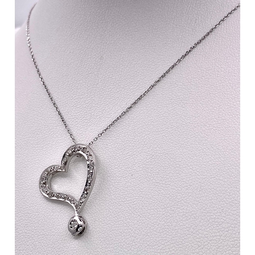 1353 - An 18K White Gold and Diamond Heart Pendant on an 18K White Gold Disappearing Necklace. 2.5cm pendan... 