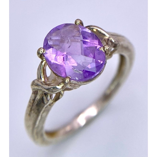 1398 - A matching set of fancy Amethyst jewellery include a pair of earrings & a solitaire ring (Size O). T... 