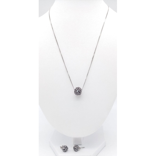 1426 - A matching set of 925 silver black Onyx jewellery include a pair of earrings and a cluster pendant o... 