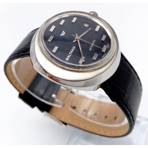 1432 - A Rare Vintage Waltham Automatic Gents Watch. Black leather strap. Stainless steel oval case - 40mm.... 