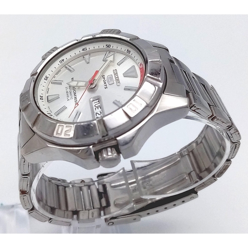 1494 - A Seiko 5 Sports Automatic Gents Watch. Stainless steel bracelet and case - 40mm. Silver tone dial w... 