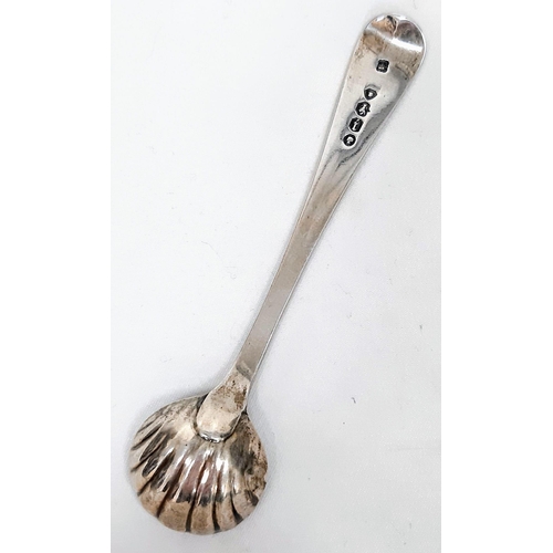 1522 - An Antique Victorian sterling silver sugar spoon with shell decoration. Full London hallmarks, 1864.... 