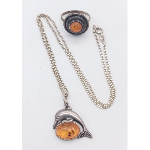 1601 - A matching set of 925 silver Amber jewellery include a solitaire ring with size N & a Dolphin 