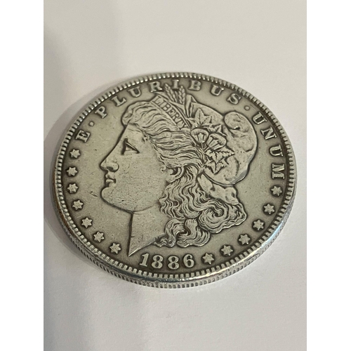 195 - United States SILVER MORGAN DOLLAR 1886. Philadelphia mint. Extra fine condition. Having bold and ra... 