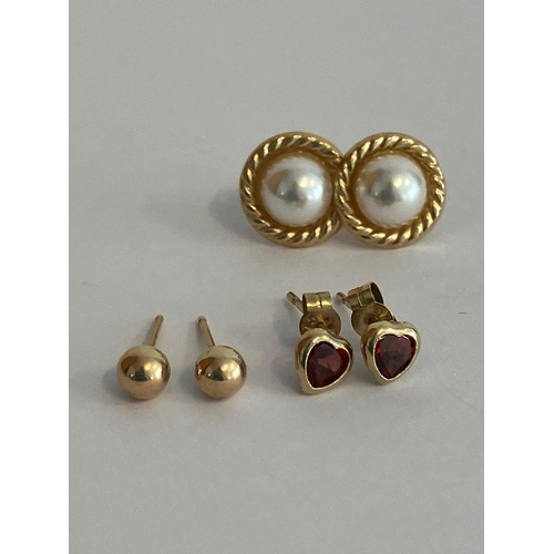 21 - 3 x pairs 9 carat GOLD EARRINGS. To include Split Pearl, Garnet, and Gold Ball Stud.. 1.04 Grams.