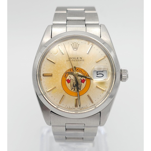 234 - A ROLEX OYSTERDATE IN STAINLESS STEEL SPORTING THE EAGLE LOGO OF ABU DHABI .(DIAL NEEDS CLEANING)  3... 