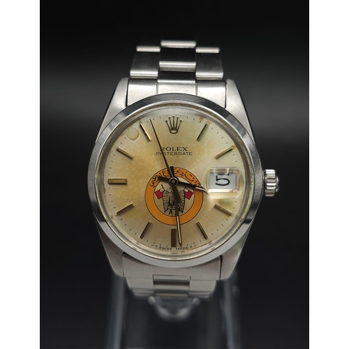 234 - A ROLEX OYSTERDATE IN STAINLESS STEEL SPORTING THE EAGLE LOGO OF ABU DHABI .(DIAL NEEDS CLEANING)  3... 