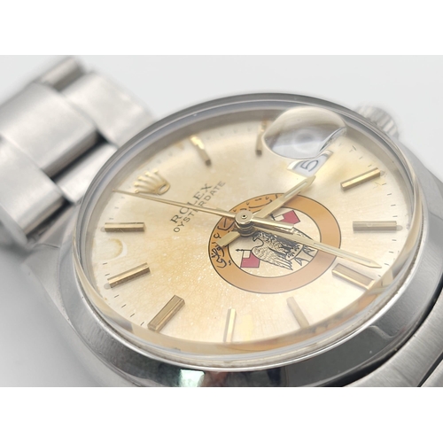 234 - A ROLEX OYSTERDATE IN STAINLESS STEEL SPORTING THE EAGLE LOGO OF ABU DHABI .(DIAL NEEDS CLEANING)  3... 