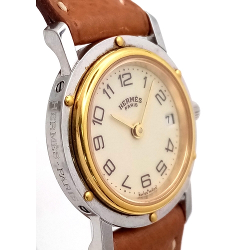 241 - A FABULOUS HERMES OF PARIS LADIES WRISTWATCH WITH GOLD AND STAINLESS STEEL BODY AND TASTEFUL CREAM D... 