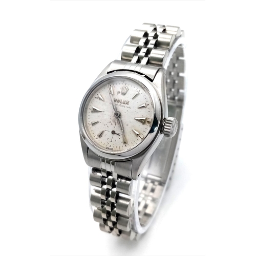 309 - A VINTAGE LADIES ROLEX OYSTER PERPETUAL IN STAINLESS STEEL , WITH AUTOMATIC MOVEMENT AND ATTRACTIVE ... 