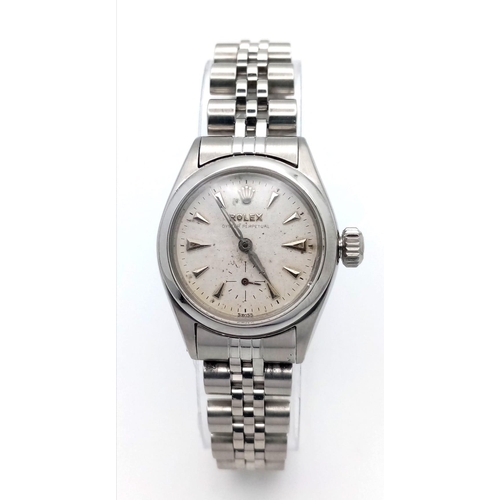 309 - A VINTAGE LADIES ROLEX OYSTER PERPETUAL IN STAINLESS STEEL , WITH AUTOMATIC MOVEMENT AND ATTRACTIVE ... 