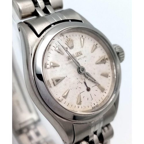 309 - A VINTAGE LADIES ROLEX OYSTER PERPETUAL IN STAINLESS STEEL , WITH AUTOMATIC MOVEMENT AND ATTRACTIVE ... 