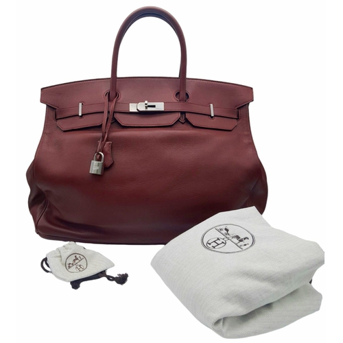 340 - A fabulous Hermes Red Birkin.
Quality leather throughout, double handled with silver toned hardware.... 