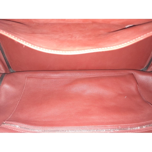 340 - A fabulous Hermes Red Birkin.
Quality leather throughout, double handled with silver toned hardware.... 