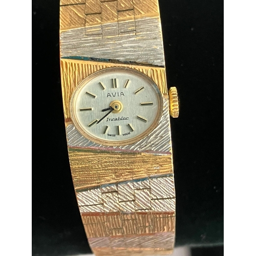 343 - Ladies Beautiful vintage AVIA BRACELET WATCH. Finished in gold and silver tone. Face showing Incablo... 