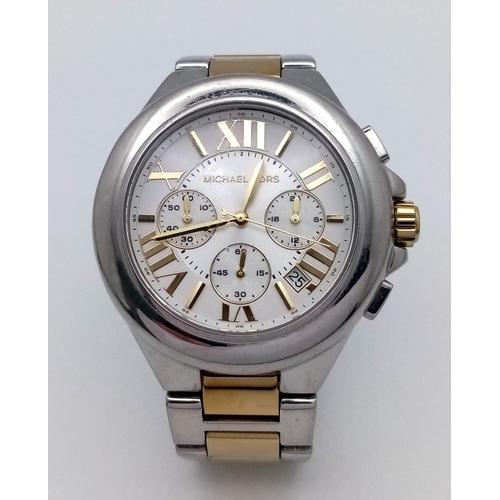 472 - A Men’s Michael Kors Model 5653 Bi-Metal Chronograph Watch. 46mm
Including Crown. Full Working Order... 