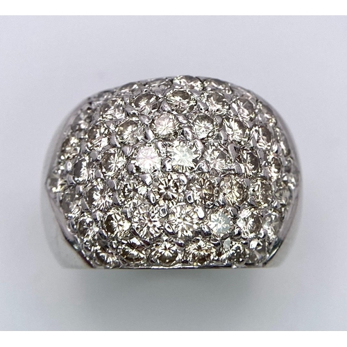 515 - A fabulous, 18KT White Gold, Diamond Paved Ring.
A real 'head-turner' of a ring.
Size: N
Weight: 11.... 