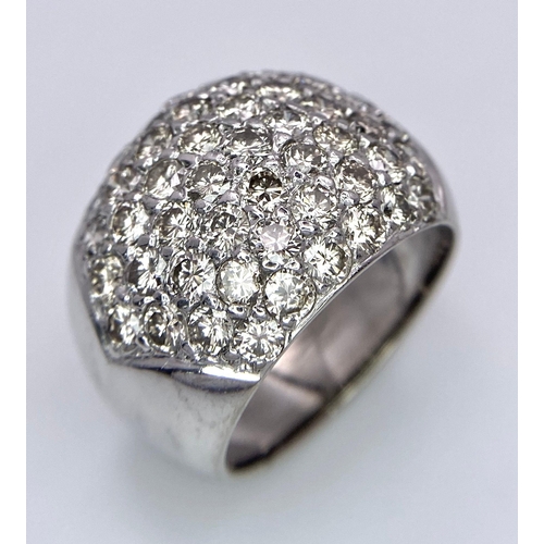 515 - A fabulous, 18KT White Gold, Diamond Paved Ring.
A real 'head-turner' of a ring.
Size: N
Weight: 11.... 