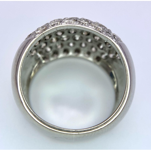 515 - A fabulous, 18KT White Gold, Diamond Paved Ring.
A real 'head-turner' of a ring.
Size: N
Weight: 11.... 