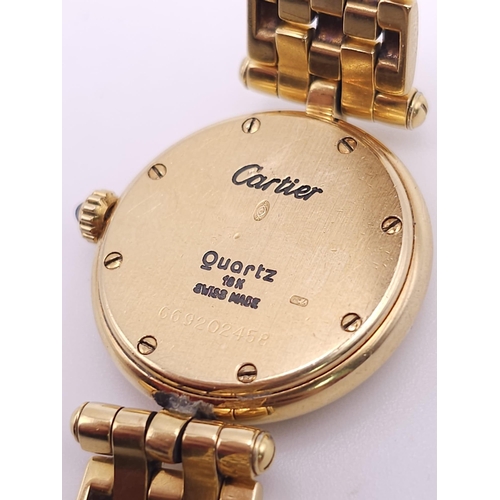 569 - A Cartier Panthere Vendome 18K Gold Ladies Watch. 18K gold bracelet and case - 24mm. White dial with... 