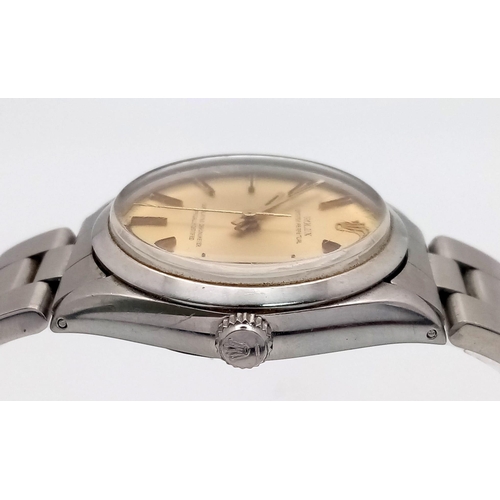 619 - A Vintage Rolex Oyster Perpetual Automatic Gents Watch. Stainless steel bracelet and case - 34mm. Go... 