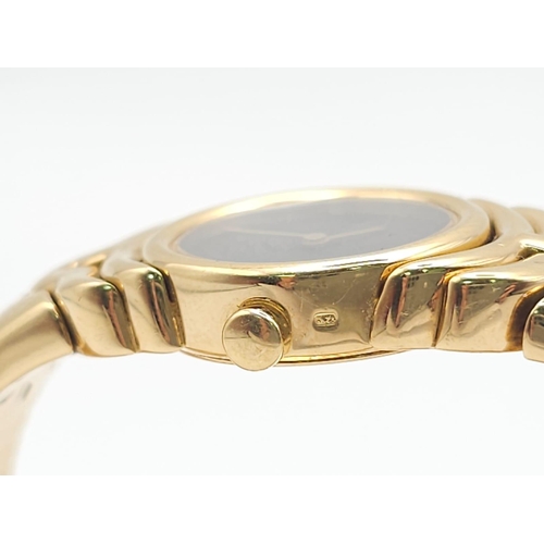 68 - A Bulgari Parentesi 18K Gold Ladies Watch. 18k gold decorative torque bracelet. 18k gold circular ca... 