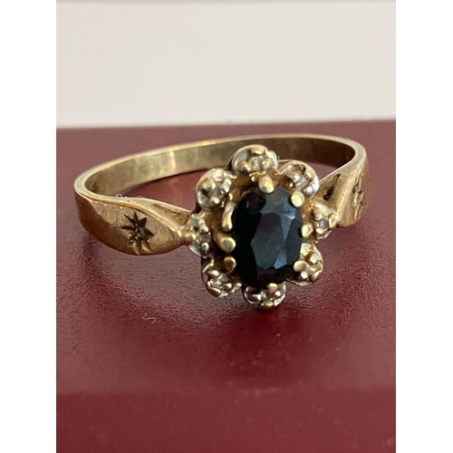 77 - 9 carat GOLD and SAPPHIRE RING . Having an oval cut SAPPHIRE set to top with DIAMOND Surround. Full ... 