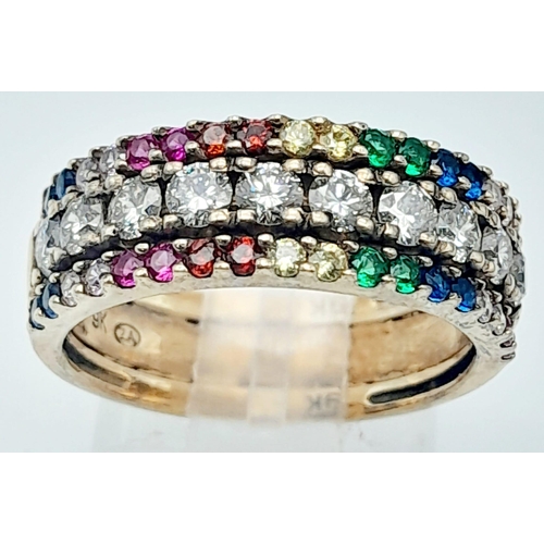 816 - A stunning, 9KT Yellow Gold, Diamond & Gem Paved Ring.
Size: N
Weight: 4.55g