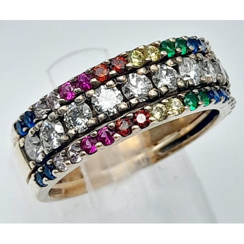 816 - A stunning, 9KT Yellow Gold, Diamond & Gem Paved Ring.
Size: N
Weight: 4.55g