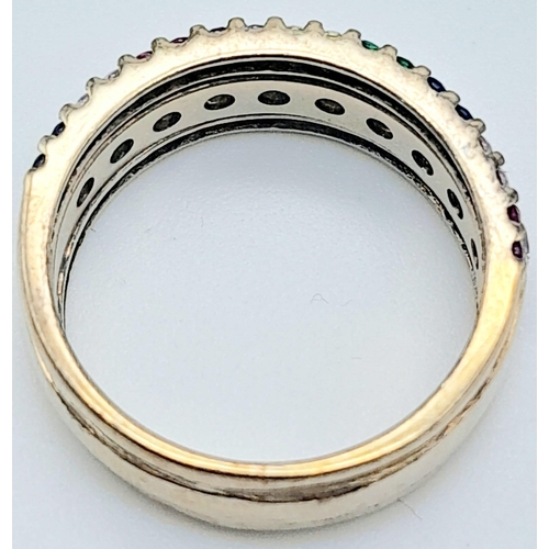 816 - A stunning, 9KT Yellow Gold, Diamond & Gem Paved Ring.
Size: N
Weight: 4.55g