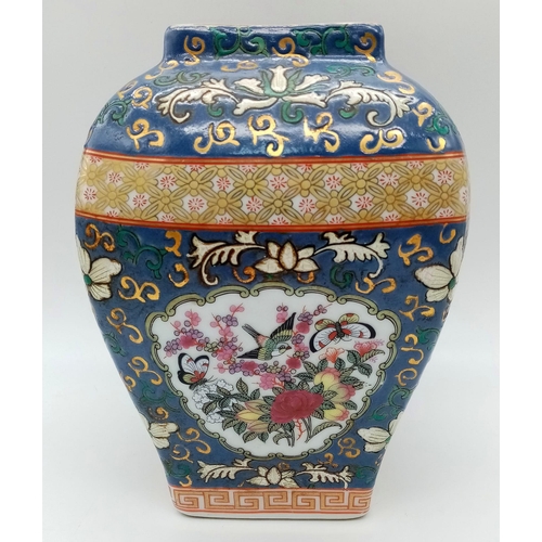 704 - Unusual Chinese  Canton Famille Rose Antique Vase. Decorated in vibrant enamel colours, depicting co... 