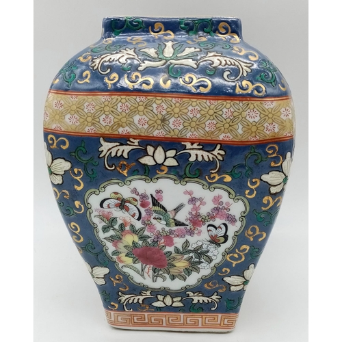 704 - Unusual Chinese  Canton Famille Rose Antique Vase. Decorated in vibrant enamel colours, depicting co... 