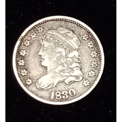 1745 - A highly sought after, 1830 USA 5 Cent Coin.
See photos for condition.