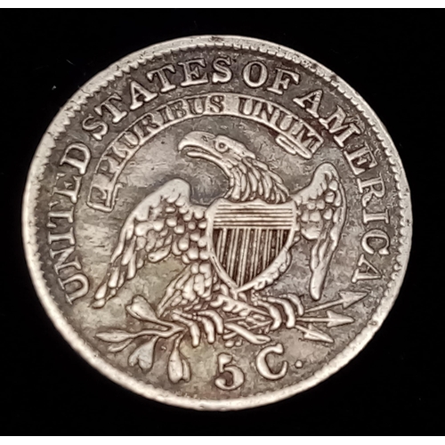 1745 - A highly sought after, 1830 USA 5 Cent Coin.
See photos for condition.