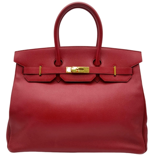 276 - A Red Hermes Togo Birkin Bag.
Considered the epitome of handbags, this classic Hermes Birkin is high... 