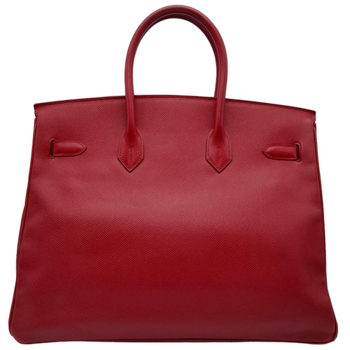 276 - A Red Hermes Togo Birkin Bag.
Considered the epitome of handbags, this classic Hermes Birkin is high... 