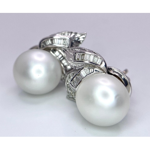 577 - A Pair of 14K White Gold, Diamond and South Sea Pearl Earrings. Large, rich, bulbous South Sea Pearl... 