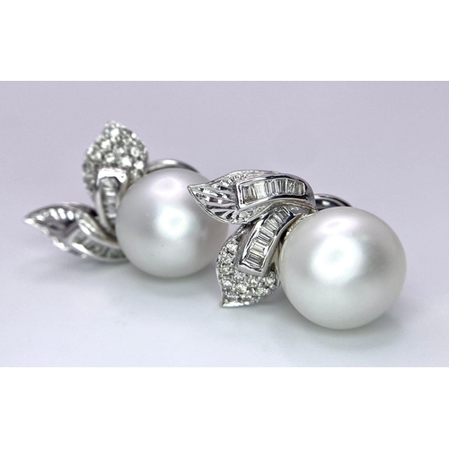 577 - A Pair of 14K White Gold, Diamond and South Sea Pearl Earrings. Large, rich, bulbous South Sea Pearl... 