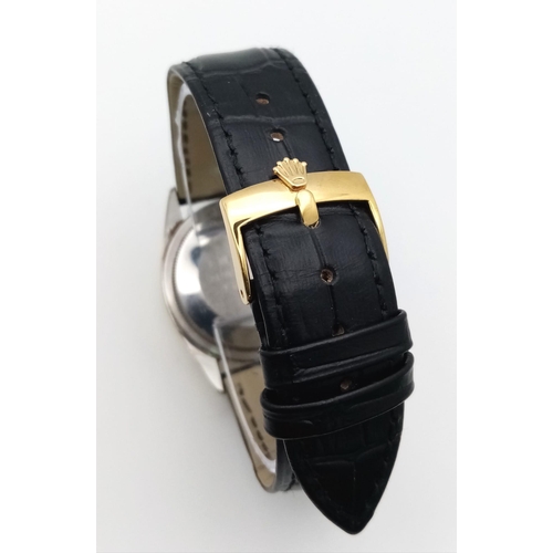 601 - A VINTAGE ROLEX OYSTER PERPETUAL GENTS WATCH ON THE ORIGINAL ROLEX BLACK LEATHER STRAP ONLY WORN A F... 