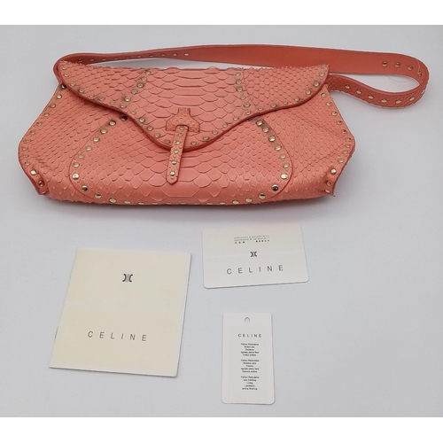 692 - The Celine bag in a delightful shade of pink is a stylish accessory crafted in Italy. With dimension... 