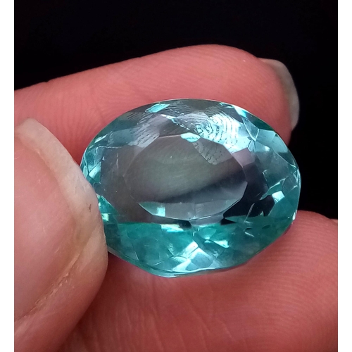 941 - A 23ct Pale Blue Aquamarine Gemstone. Well faceted oval cut with a trillion base. No visible marks o... 